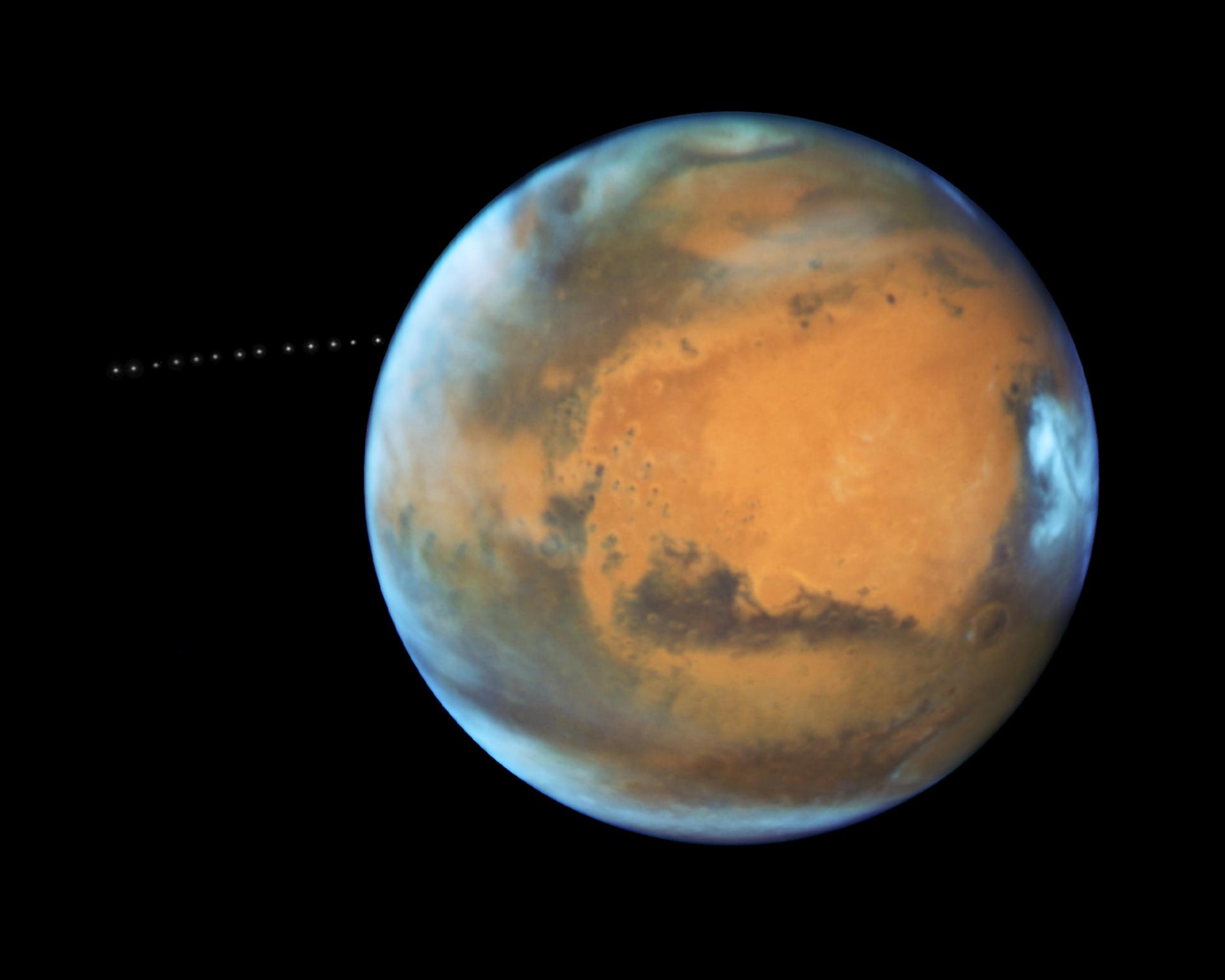 Mars photographed by the Hubble Space Telescope, showing the full disk of the Red Planet