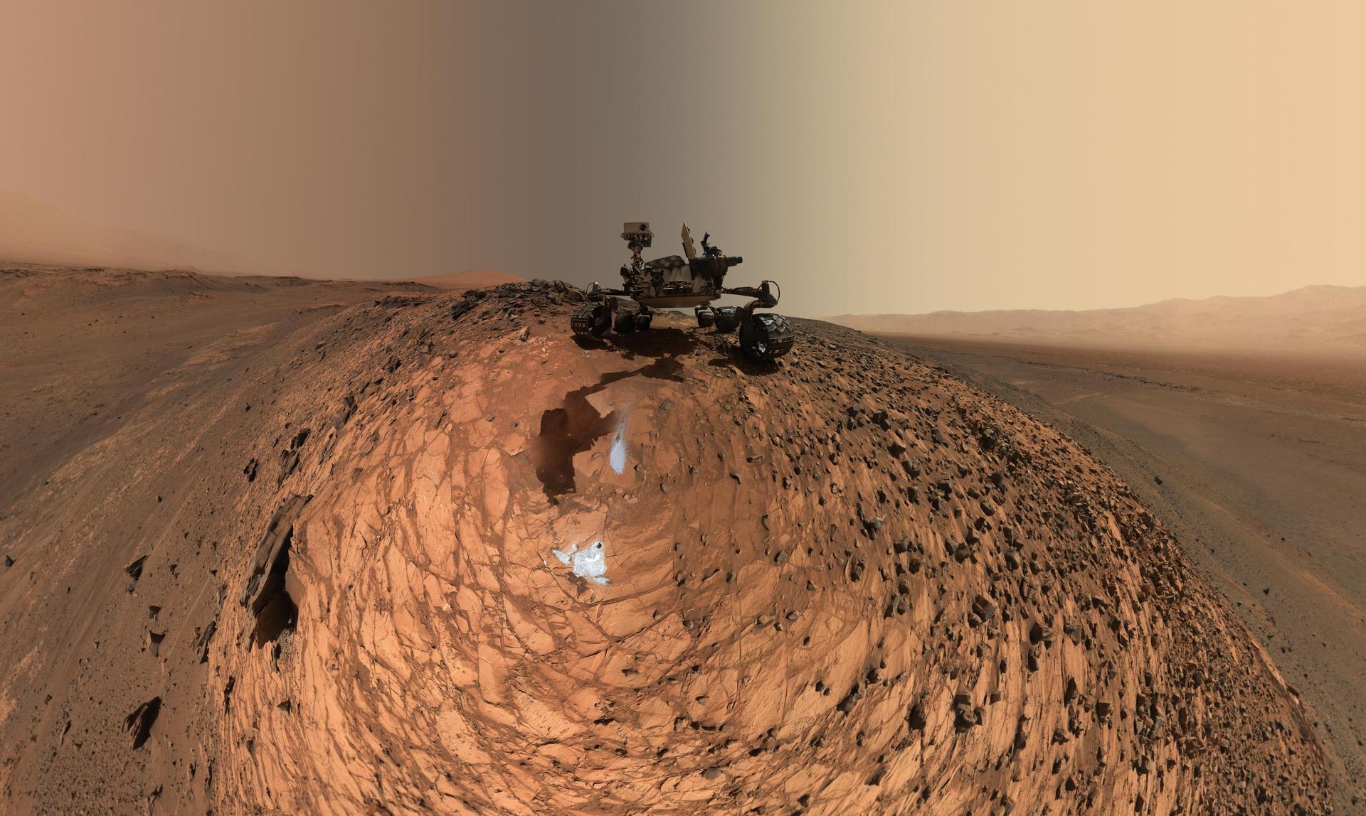 NASA’s Curiosity rover on the barren slopes of Mount Sharp on Mars